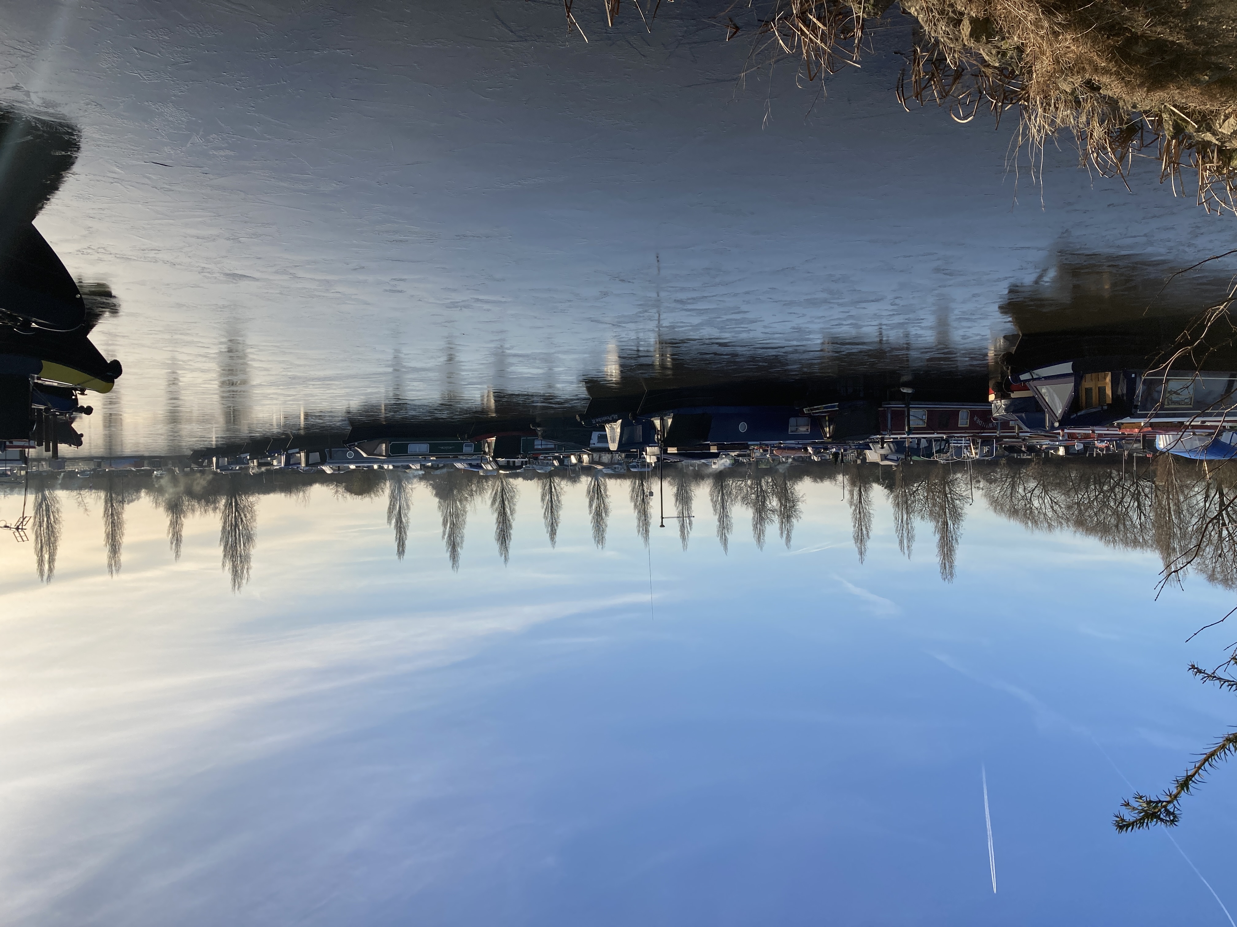 narrowboats in frozen over sawley marina
