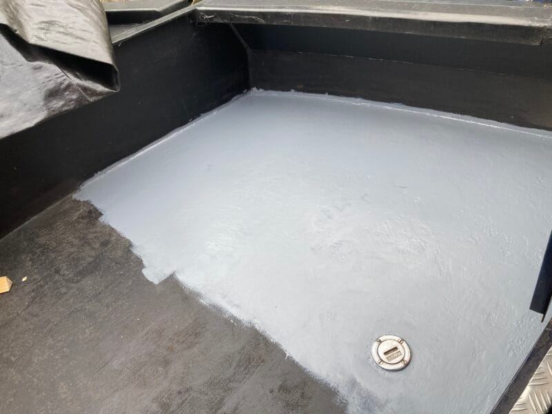 zinc primer on narrowboat welldeck